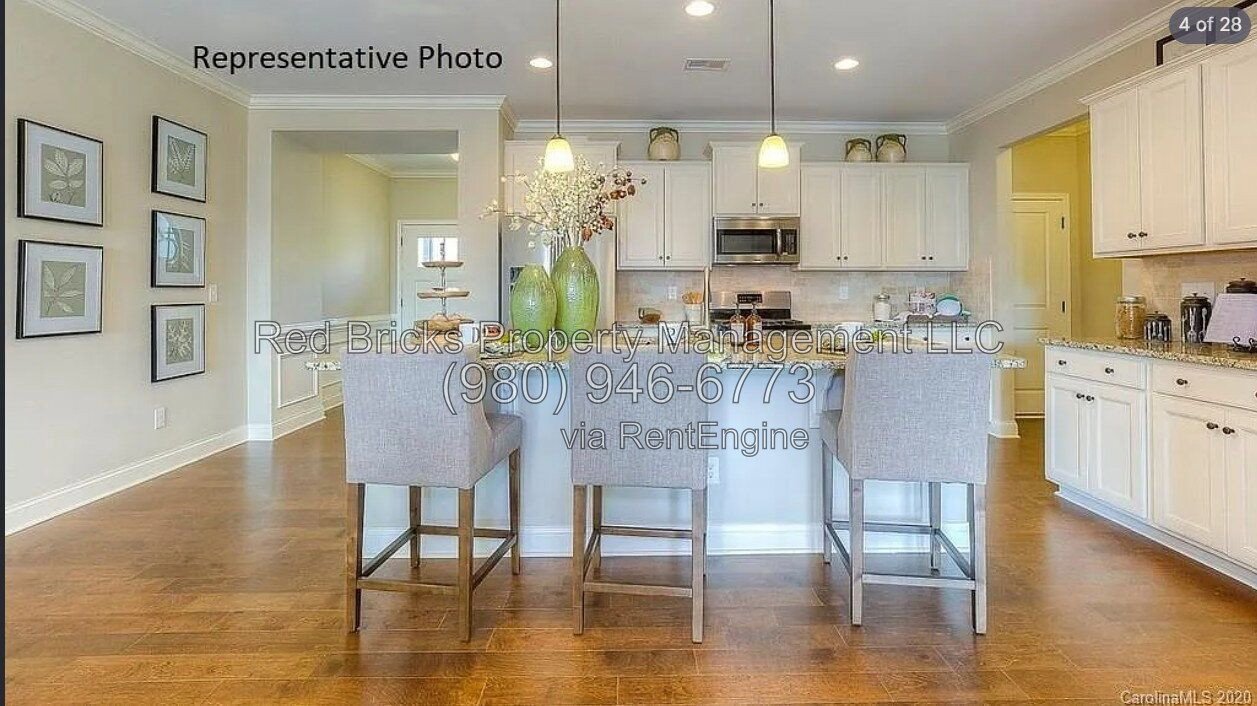 Like-New End-Unit Townhome with 4 Beds & Resort-Style Amenities! property image
