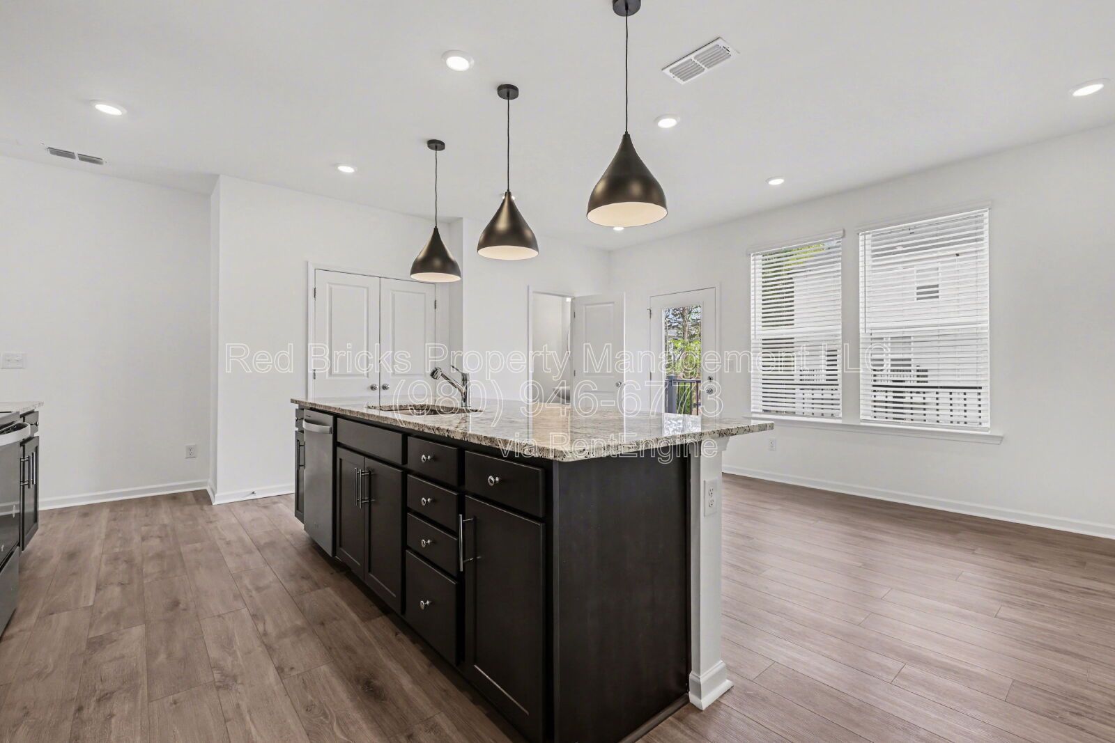 Modern 3-Story Townhome with Dual Suites & Garage – Move-In Ready! property image
