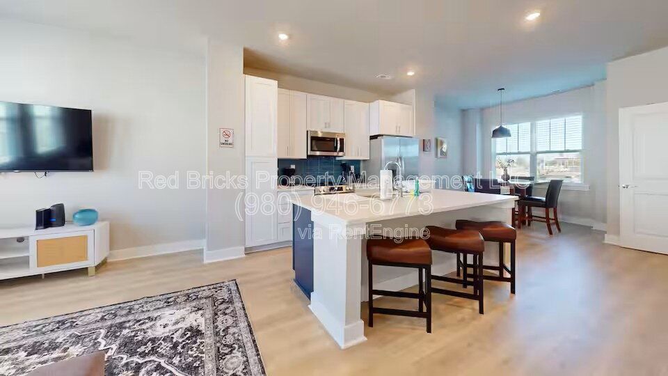 Modern 3-Story End Unit Near Uptown – Like New & Move-In Ready! property image
