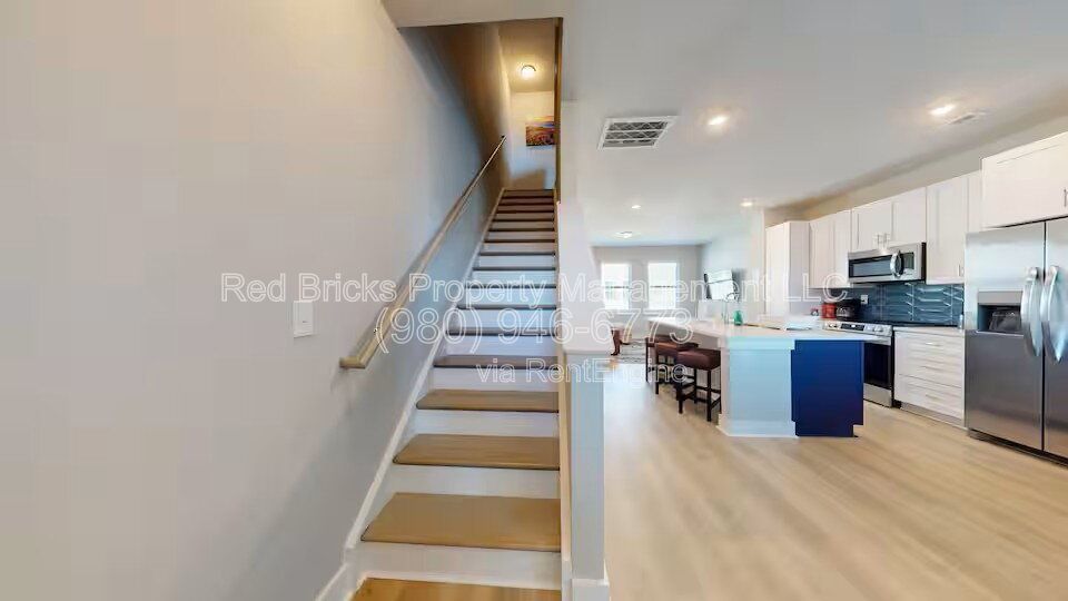 Modern 3-Story End Unit Near Uptown – Like New & Move-In Ready! property image