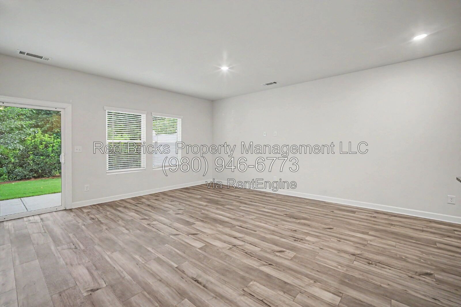 Like-New Townhome with 2-Car Garage in Enclave at City Park property image
