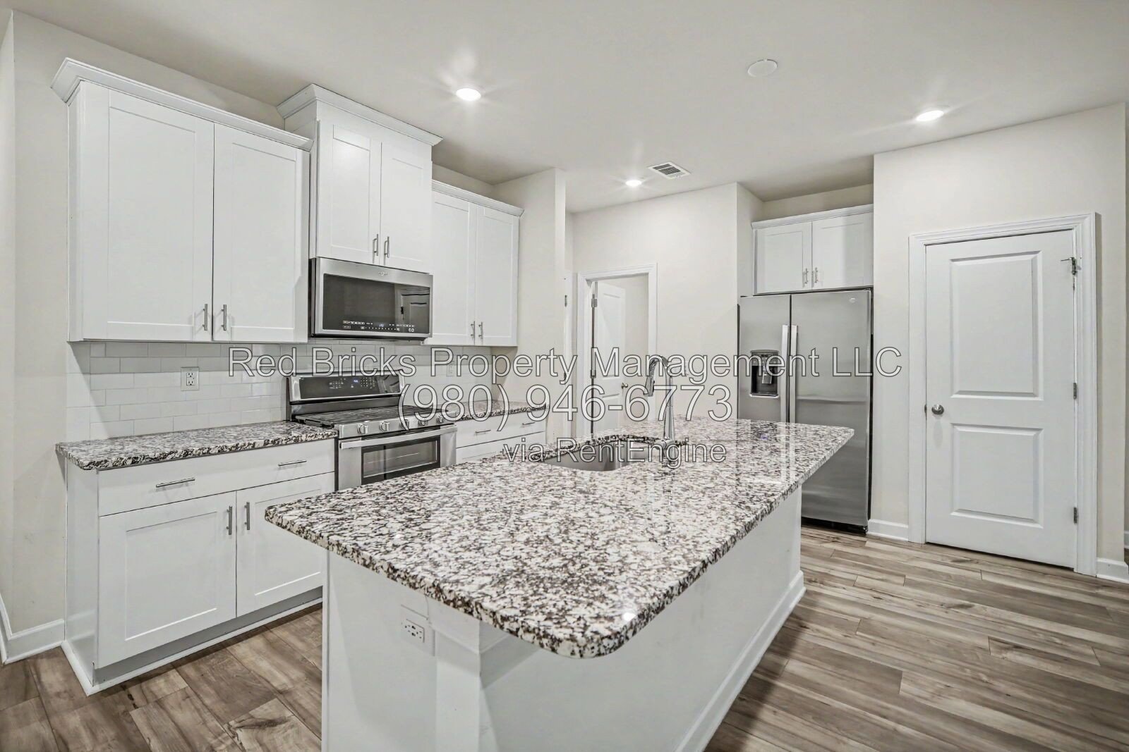 Like-New Townhome with 2-Car Garage in Enclave at City Park property image