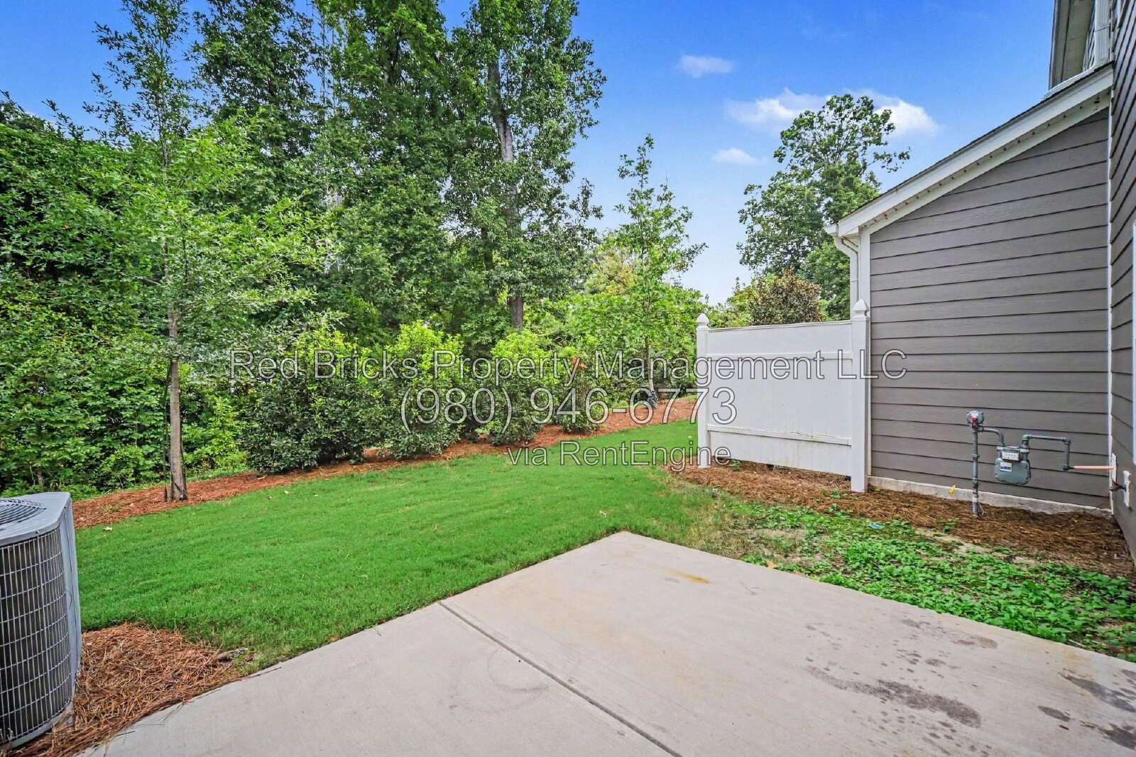 Like-New Townhome with 2-Car Garage in Enclave at City Park property image