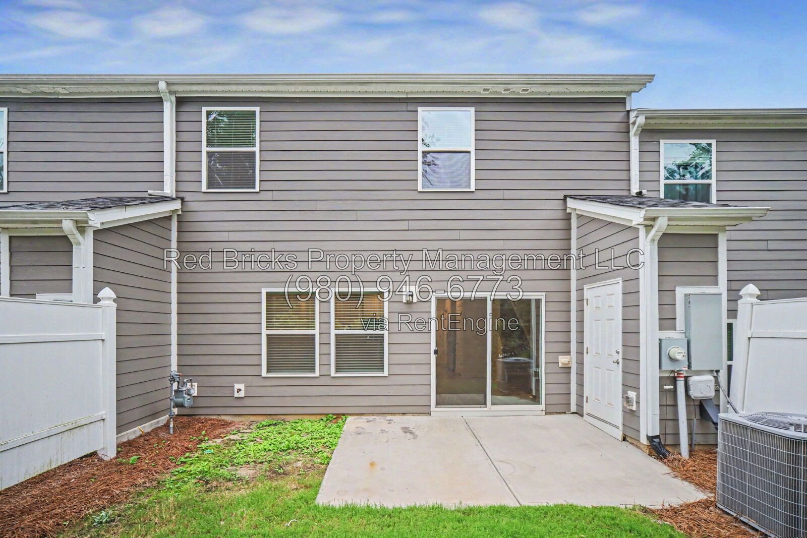 Like-New Townhome with 2-Car Garage in Enclave at City Park property image